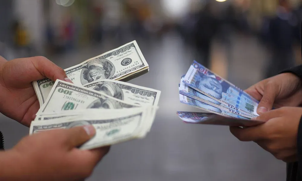 Cómo Cambiar Dólares a Soles en Perú